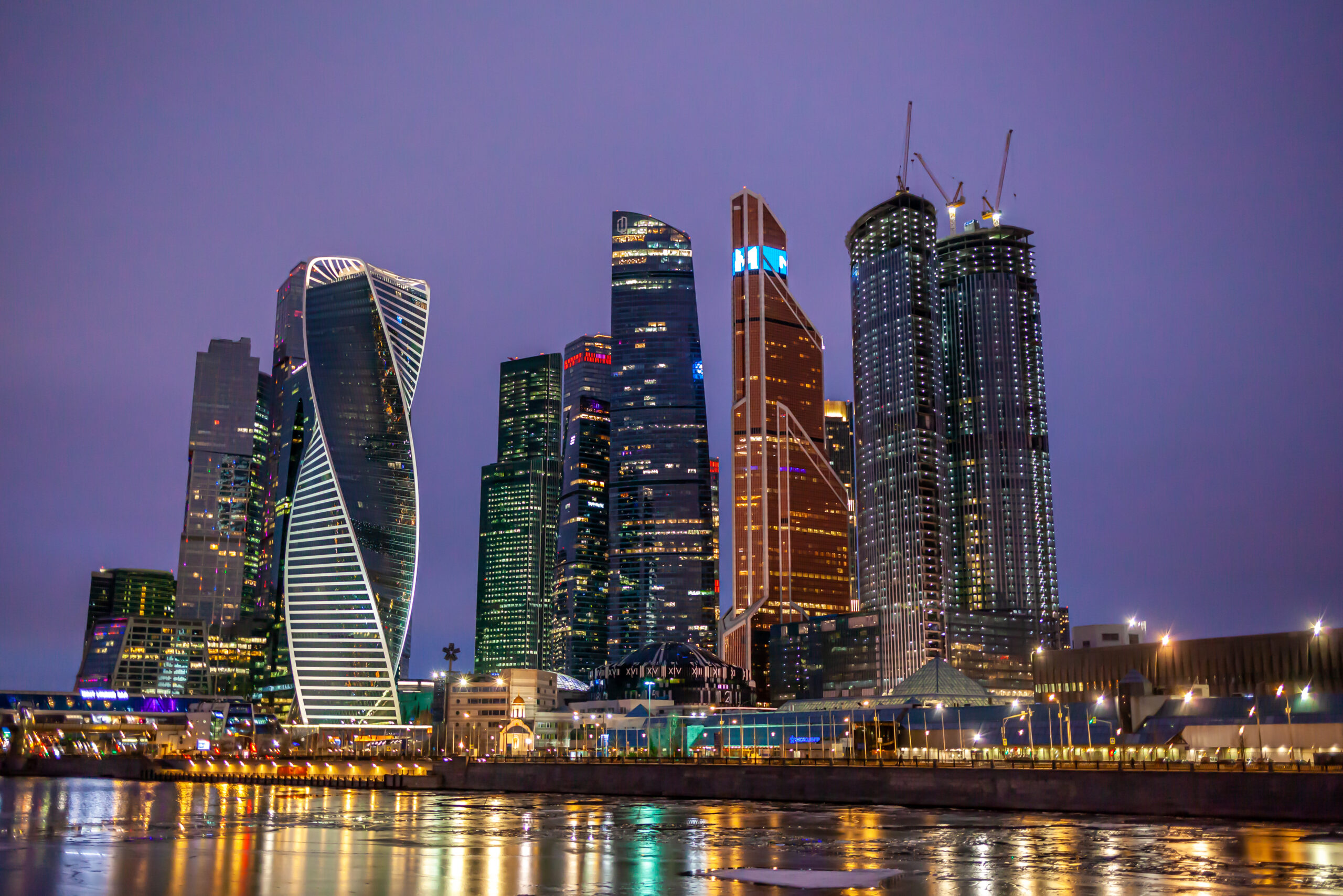 Moscow City skyscraper buildings with windows night view.